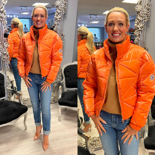 Molly Bracken orange coat