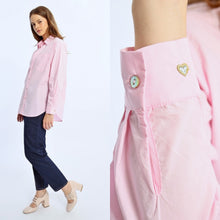 Molly Bracken pink shirt